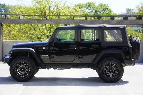 Black 2016 Jeep Wrangler Unlimited Sport