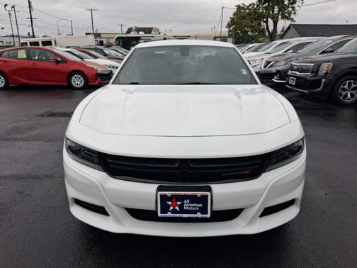White knuckle 2023 Dodge Charger SXT