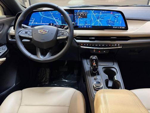 Radiant Red Tintcoat 2025 Cadillac XT4 Premium Luxury