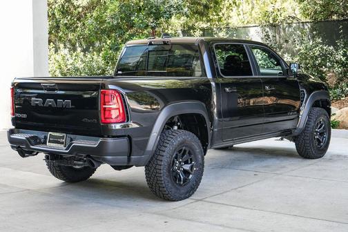 Diamond Black Crystal Pearlcoat 2026 RAM 1500 RHO Crew Cab 4x4 5'7' Box