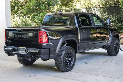 Diamond Black Crystal Pearlcoat 2026 RAM 1500 RHO Crew Cab 4x4 5'7' Box