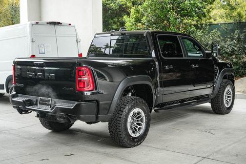 Diamond Black Crystal Pearlcoat 2026 RAM 1500 RHO Crew Cab 4x4 5'7' Box