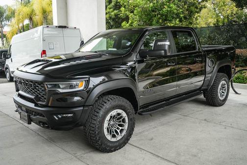 Diamond Black Crystal Pearlcoat 2026 RAM 1500 RHO Crew Cab 4x4 5'7' Box