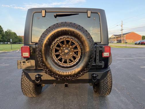 Black 2016 Jeep Wrangler Unlimited Sport
