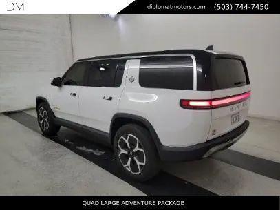 Glacier White 2024 Rivian R1S Adventure Quad Motor Large Pack
