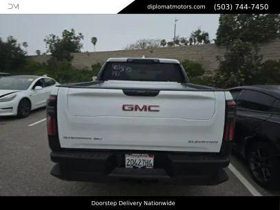 Summit White 2026 GMC Sierra EV Standard Range Elevation