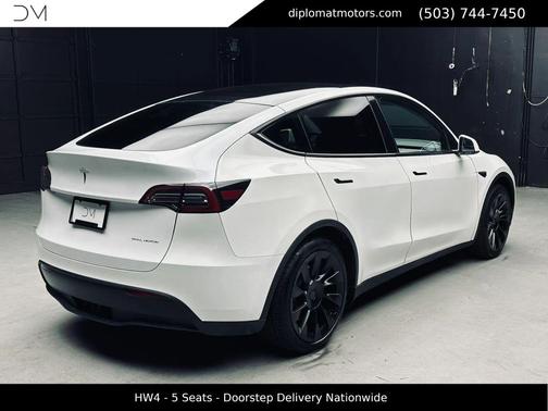 Pearl White Multi-Coat 2024 Tesla Model Y Long Range Dual Motor All-Wheel Drive