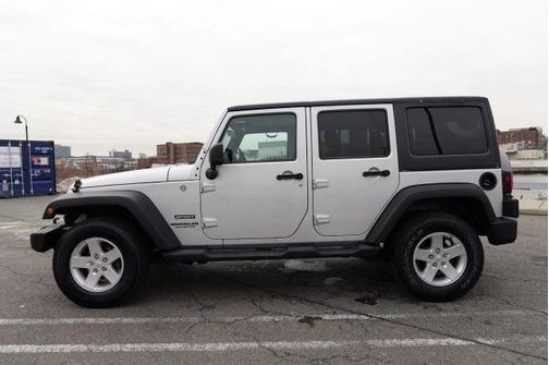 Silver 2011 Jeep Wrangler Unlimited Sport