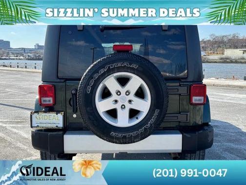 Green 2011 Jeep Wrangler Unlimited Sahara