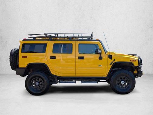 Yellow 2004 Hummer H2 Base