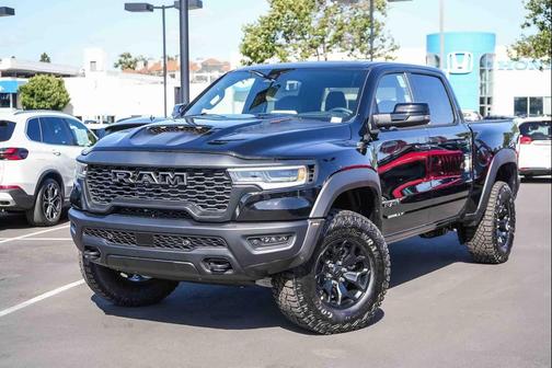 Diamond Black Crystal Pearlcoat 2026 RAM 1500 RHO Crew Cab 4x4 5'7' Box