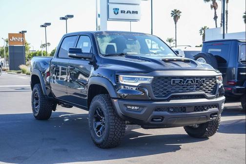 Diamond Black Crystal Pearlcoat 2026 RAM 1500 RHO Crew Cab 4x4 5'7' Box
