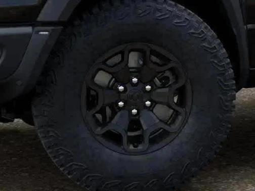 Diamond Black Crystal Pearlcoat 2026 RAM 1500 RHO Crew Cab 4x4 5'7' Box