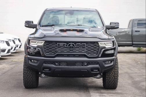 Diamond Black Crystal Pearlcoat 2026 RAM 1500 RHO Crew Cab 4x4 5'7' Box