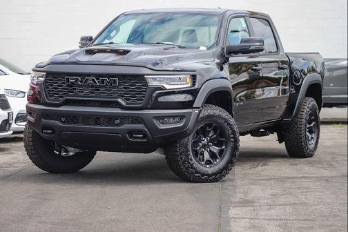 Diamond Black Crystal Pearlcoat 2026 RAM 1500 RHO Crew Cab 4x4 5'7' Box
