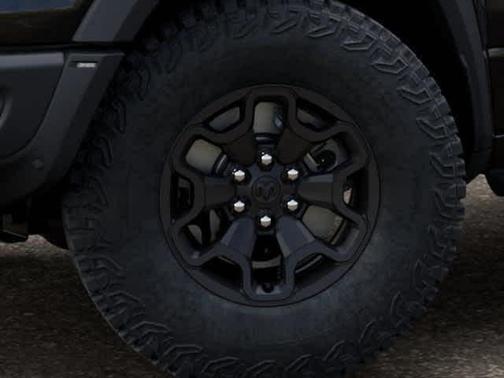 Diamond Black Crystal Pearlcoat 2026 RAM 1500 RHO Crew Cab 4x4 5'7' Box