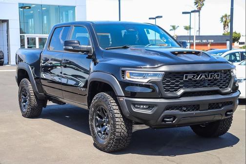 Diamond Black Crystal Pearlcoat 2026 RAM 1500 RHO Crew Cab 4x4 5'7' Box