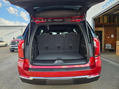 Volcanic Red Tintcoat 2026 GMC Yukon 4WD Elevation