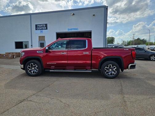 Volcanic Red Tintcoat 2026 GMC Sierra 1500 SLT