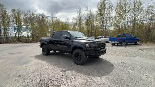 Diamond Black Crystal Pearlcoat 2026 RAM 1500 RHO Crew Cab 4x4 5'7' Box