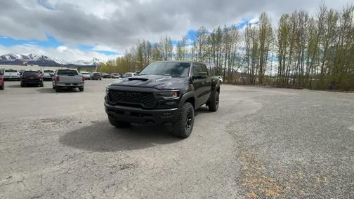 Diamond Black Crystal Pearlcoat 2026 RAM 1500 RHO Crew Cab 4x4 5'7' Box