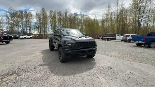 Diamond Black Crystal Pearlcoat 2026 RAM 1500 RHO Crew Cab 4x4 5'7' Box