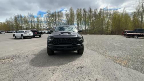 Diamond Black Crystal Pearlcoat 2026 RAM 1500 RHO Crew Cab 4x4 5'7' Box