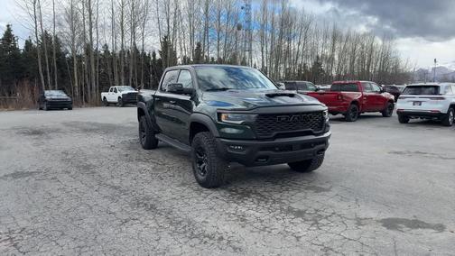 Serrano Green Metallic 2026 RAM 1500 RHO Crew Cab 4x4 5'7' Box