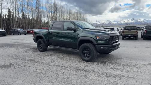 Serrano Green Metallic 2026 RAM 1500 RHO Crew Cab 4x4 5'7' Box
