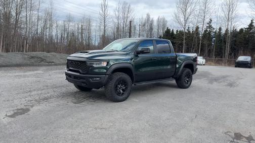 Serrano Green Metallic 2026 RAM 1500 RHO Crew Cab 4x4 5'7' Box