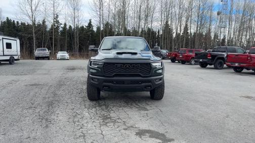Serrano Green Metallic 2026 RAM 1500 RHO Crew Cab 4x4 5'7' Box