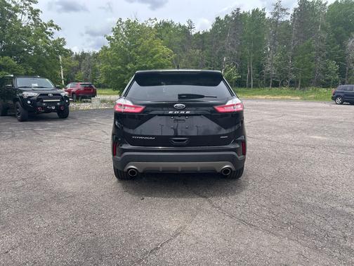 AGATE BLACK METALLIC 2024 Ford Edge Titanium