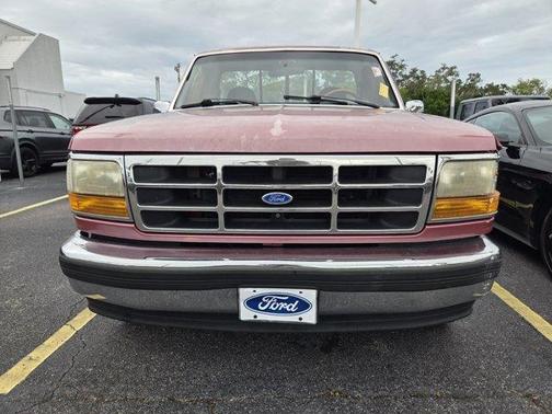 Red 1995 Ford F-150 XLT