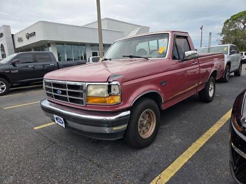 Red 1995 Ford F-150 XLT