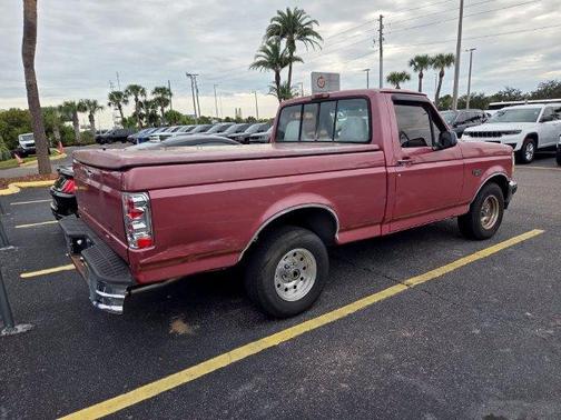 Red 1995 Ford F-150 XLT