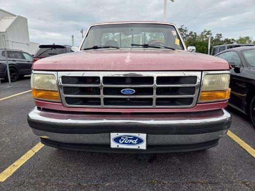 Red 1995 Ford F-150 XLT