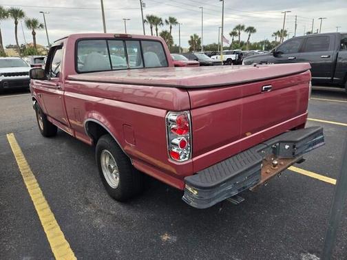 Red 1995 Ford F-150 XLT