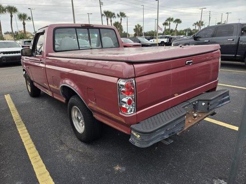 Red 1995 Ford F-150 XLT