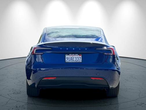 Dark Blue 2025 Tesla Model 3