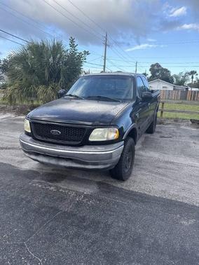 Black 2002 Ford F-150 XL SuperCab