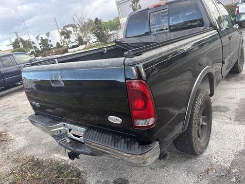 Black 2002 Ford F-150 XL SuperCab
