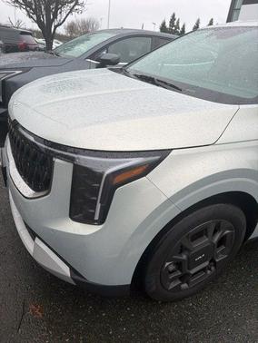 Ivory Silver 2025 Kia Carnival Hybrid EX