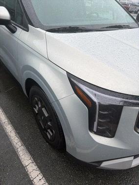 Ivory Silver 2025 Kia Carnival Hybrid EX