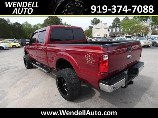 Red 2013 Ford F-250 Platinum