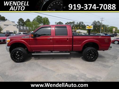 Red 2013 Ford F-250 Platinum