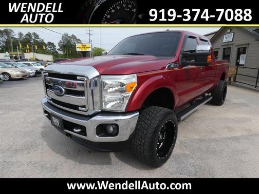Red 2013 Ford F-250 Platinum