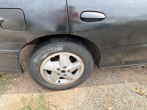 Black 1995 Pontiac Sunfire SE