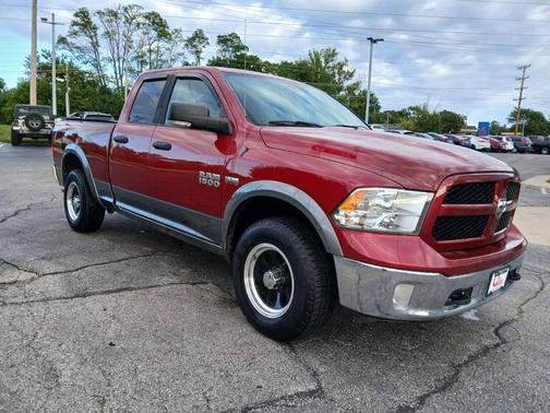 2013 RAM 1500 Outdoorsman 4x4 4dr Quad Cab 6.3 ft. SB Pickup