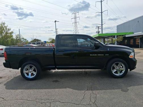 Black 2012 RAM 1500 Express 4x4 4dr Quad Cab 6.3 ft. SB Pickup