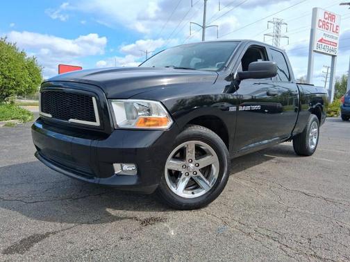 Black 2012 RAM 1500 Express 4x4 4dr Quad Cab 6.3 ft. SB Pickup